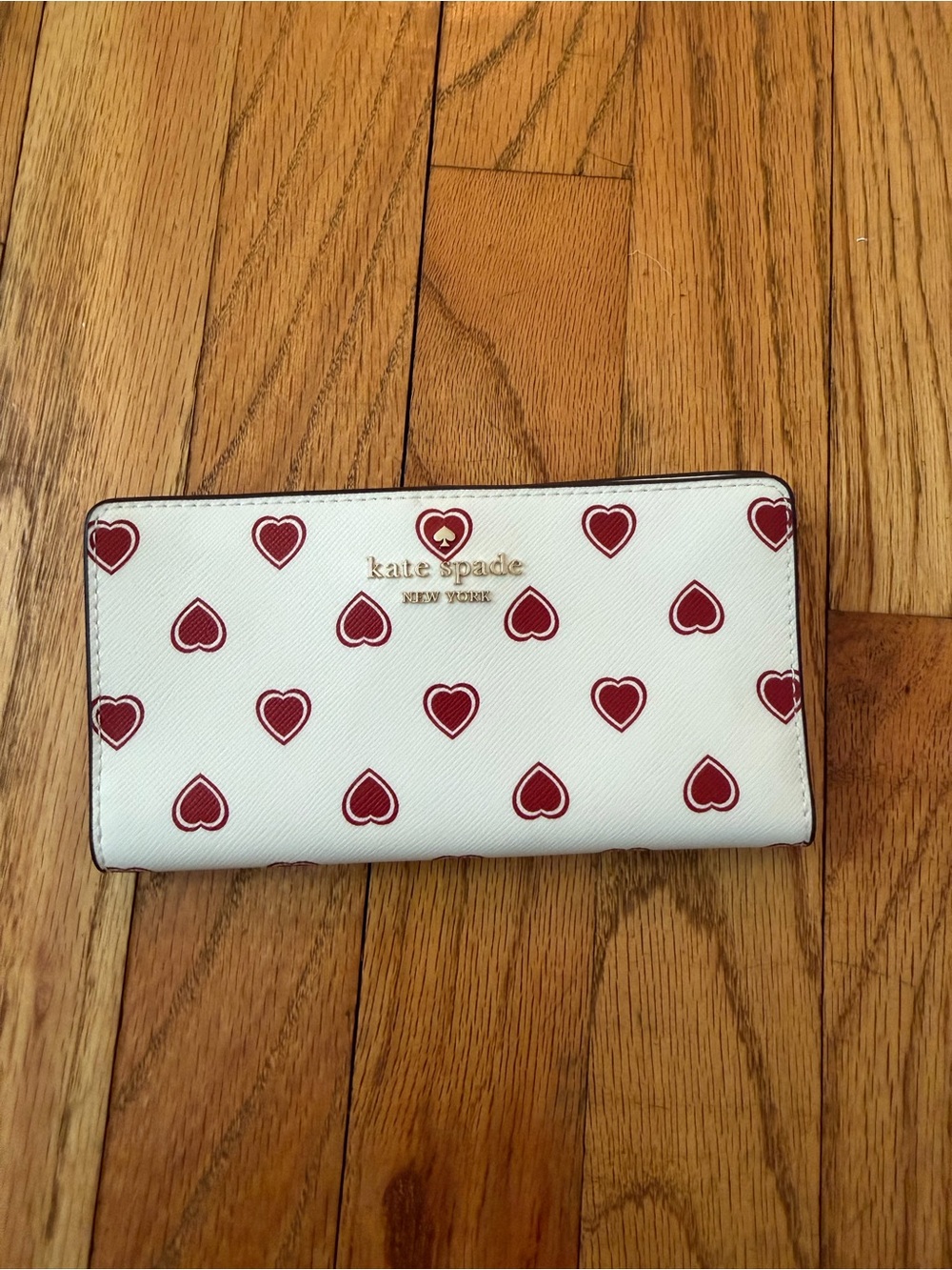 kate spade White Wallet with Red Heart Motif and Gold Logo